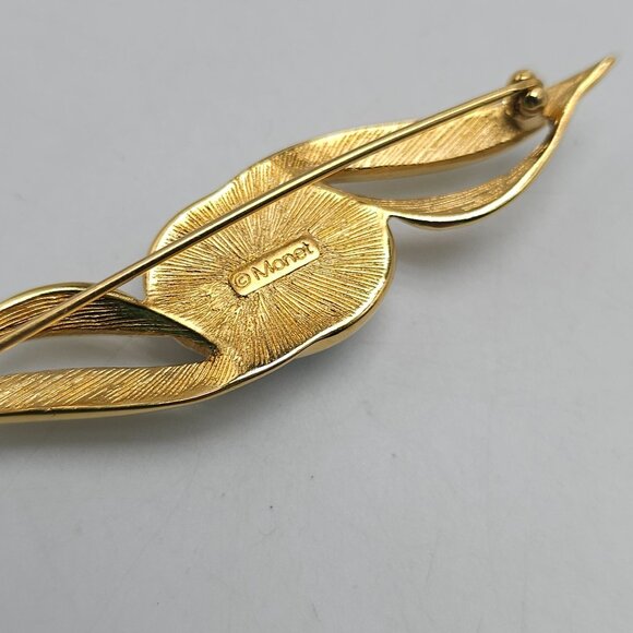 Monet Gold Tone Brooch With White Cabochon Oval Center Abstract Design - Picture 4 of 5